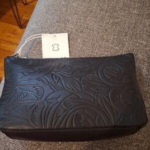The Sak Black Leaf Leather Pouch.